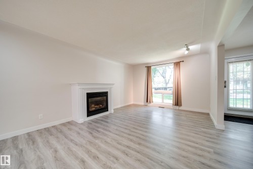 10519 140 Street Nw, Edmonton, AB - Indoor Photo Showing Living Room With Fireplace