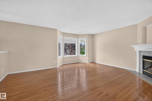 #111 1670 Jamha Rd Nw, Edmonton, AB - Indoor With Fireplace