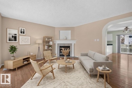 #111 1670 Jamha Rd Nw, Edmonton, AB - Indoor Photo Showing Living Room With Fireplace