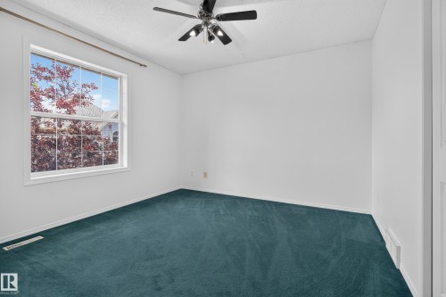 #111 1670 Jamha Rd Nw, Edmonton, AB - Indoor Photo Showing Other Room