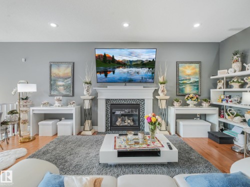 544 Adams Way Sw, Edmonton, AB - Indoor Photo Showing Living Room With Fireplace