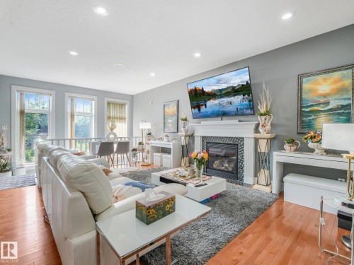 544 Adams Way Sw, Edmonton, AB - Indoor Photo Showing Living Room With Fireplace