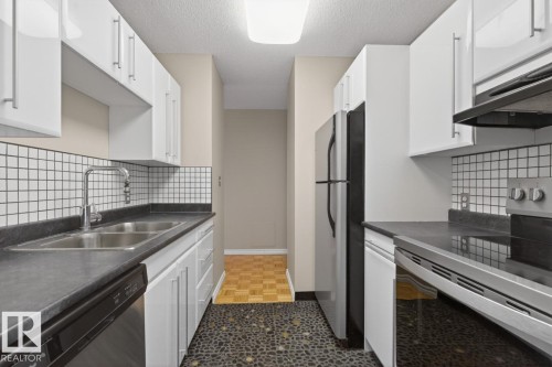 #605 11307 99 Av Nw, Edmonton, AB - Indoor Photo Showing Kitchen With Stainless Steel Kitchen With Double Sink