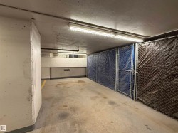 Parking stall is located at the end of the row and has one of the few full-length storage cages for additional items like bikes, seasonal items etc. - 