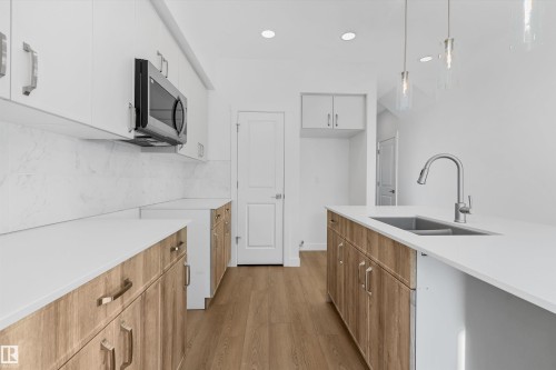18863 29 Avenue Nw, Edmonton, AB - Indoor Photo Showing Kitchen With Double Sink With Upgraded Kitchen