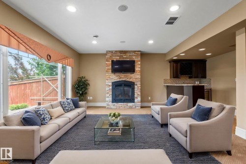 5320 Mullen Bend Nw, Edmonton, AB - Indoor Photo Showing Living Room With Fireplace