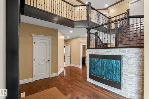 5320 Mullen Bend Nw, Edmonton, AB - Indoor Photo Showing Other Room With Fireplace