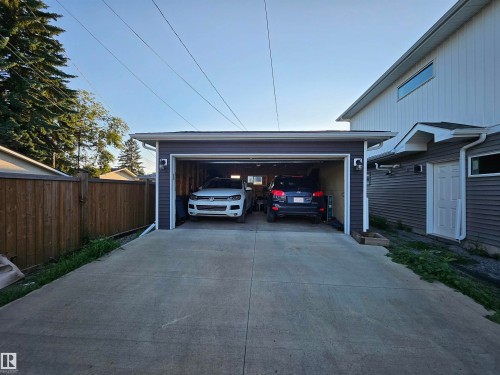 Two-car detached garage with dark gray siding and white trim - 13309 104 Street Nw, Edmonton, AB - Outdoor