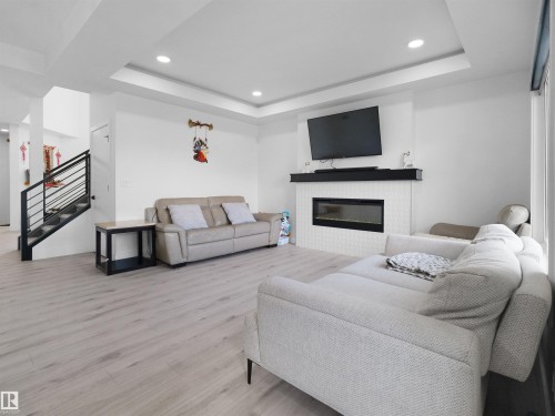 2520 12 Avenue Nw, Edmonton, AB - Indoor Photo Showing Living Room With Fireplace