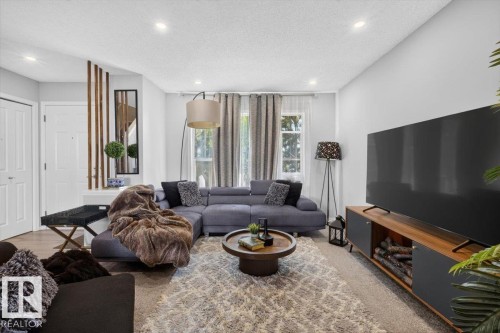 6030 S Terwillegar Boulevard Nw, Edmonton, AB - Indoor Photo Showing Living Room With Fireplace