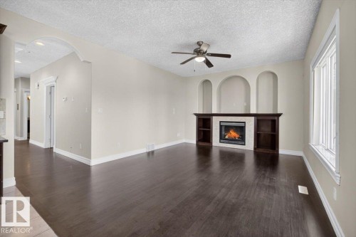 2836 34A Avenue Nw, Edmonton, AB - Indoor Photo Showing Living Room With Fireplace