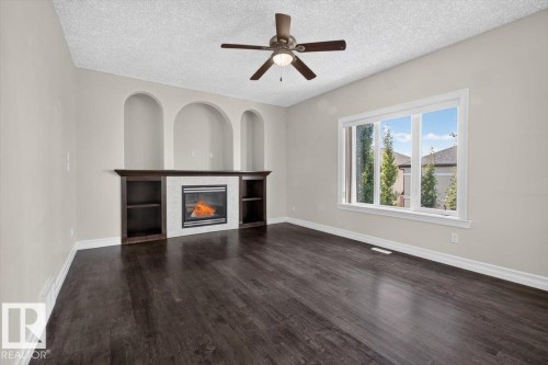 2836 34A Avenue Nw, Edmonton, AB - Indoor Photo Showing Living Room With Fireplace