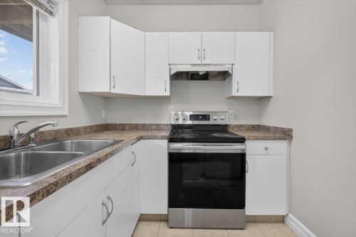 2836 34A Avenue Nw, Edmonton, AB - Indoor Photo Showing Kitchen With Double Sink