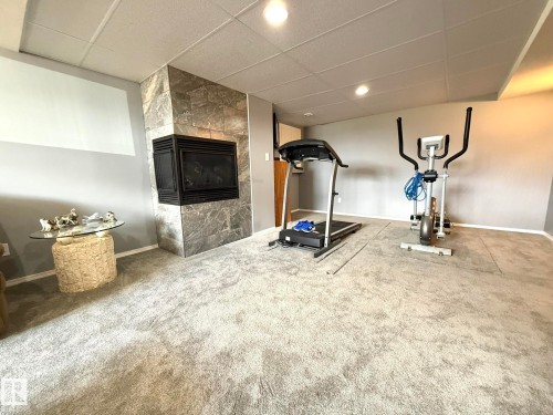 Interior space with recessed lighting and light gray walls - 4508 57 Avenue, Lamont, AB - Indoor Photo Showing Gym Room