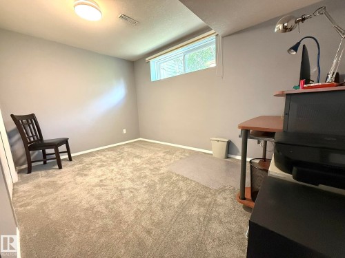 Photo of the 4th Basement Bedroom! Note the EXTRA LARGE WINDOW! - 4508 57 Avenue, Lamont, AB - Indoor Photo Showing Other Room