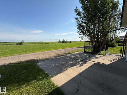 Expansive green fields bordering the property - 4508 57 Avenue, Lamont, AB - Outdoor With View