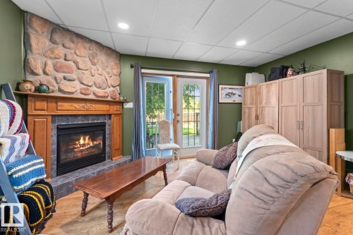 4102 54 Avenue, Cold Lake, AB - Indoor Photo Showing Other Room With Fireplace