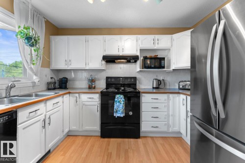4102 54 Avenue, Cold Lake, AB - Indoor Photo Showing Kitchen With Double Sink