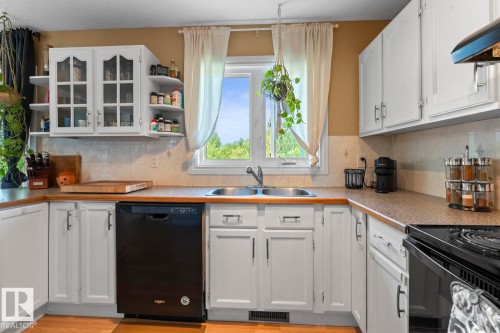 4102 54 Avenue, Cold Lake, AB - Indoor Photo Showing Kitchen With Double Sink