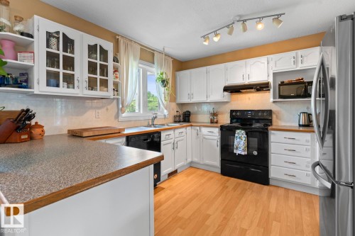4102 54 Avenue, Cold Lake, AB - Indoor Photo Showing Kitchen With Double Sink