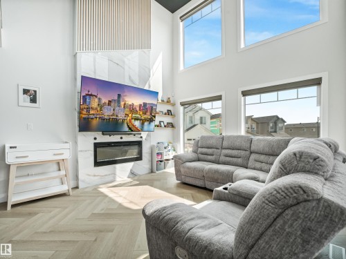 4621 170A Avenue Nw, Edmonton, AB - Indoor Photo Showing Living Room With Fireplace