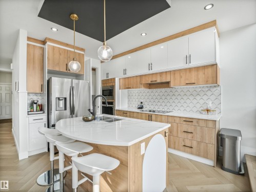 4621 170A Avenue Nw, Edmonton, AB - Indoor Photo Showing Kitchen With Stainless Steel Kitchen With Double Sink With Upgraded Kitchen