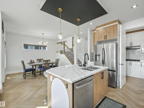 4621 170A Avenue Nw, Edmonton, AB - Indoor Photo Showing Kitchen With Stainless Steel Kitchen With Double Sink With Upgraded Kitchen