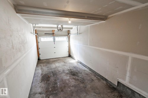 #20 1530 Tamarack Boulevard Nw, Edmonton, AB - Indoor Photo Showing Garage