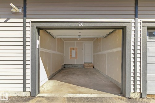 #20 1530 Tamarack Boulevard Nw, Edmonton, AB - Indoor Photo Showing Garage