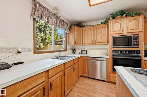 Kitchen - 4108 Ramsay Road Nw, Edmonton, AB - Indoor Photo Showing Kitchen With Stainless Steel Kitchen With Double Sink