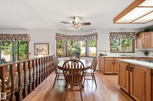 Kitchen dining area featuring wood-finish flooring - 4108 Ramsay Road Nw, Edmonton, AB - Indoor