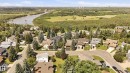 Residential neighborhood with mature trees, established homes, and a river backdrop - 4108 Ramsay Road Nw, Edmonton, AB  - Outdoor With View 