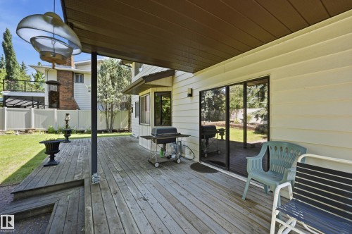 Expansive wood deck with covered patio area - 4108 Ramsay Road Nw, Edmonton, AB - Outdoor With Deck Patio Veranda With Exterior