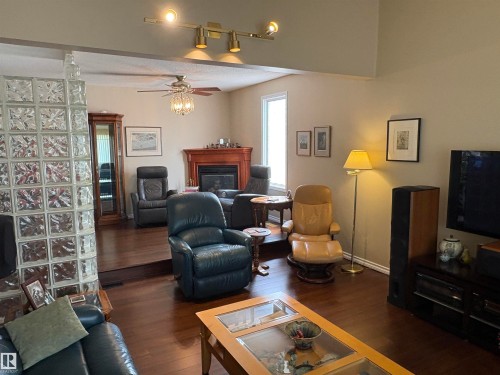 4309 42 Street, Leduc, AB - Indoor Photo Showing Living Room With Fireplace