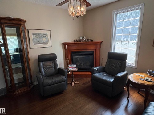 4309 42 Street, Leduc, AB - Indoor Photo Showing Living Room With Fireplace