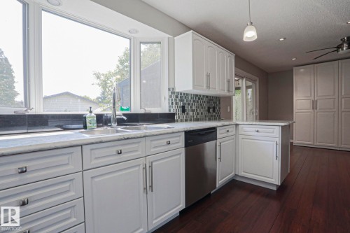 4309 42 Street, Leduc, AB - Indoor Photo Showing Kitchen With Double Sink