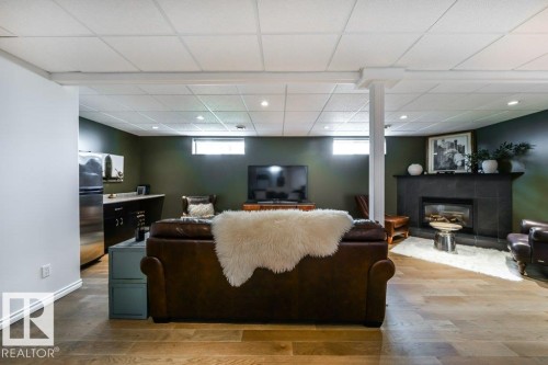 16103 72 Street Nw, Edmonton, AB - Indoor Photo Showing Basement With Fireplace