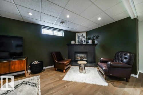 16103 72 Street Nw, Edmonton, AB - Indoor Photo Showing Basement With Fireplace