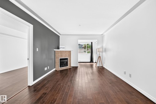 #105 9938 104 St Nw, Edmonton, AB - Indoor With Fireplace