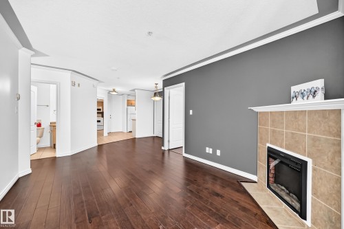 #105 9938 104 St Nw, Edmonton, AB - Indoor With Fireplace