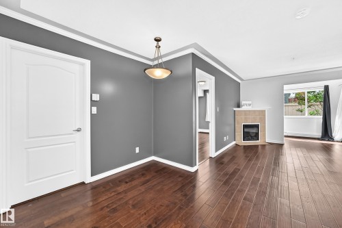 #105 9938 104 St Nw, Edmonton, AB - Indoor With Fireplace