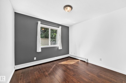 #105 9938 104 St Nw, Edmonton, AB - Indoor Photo Showing Other Room