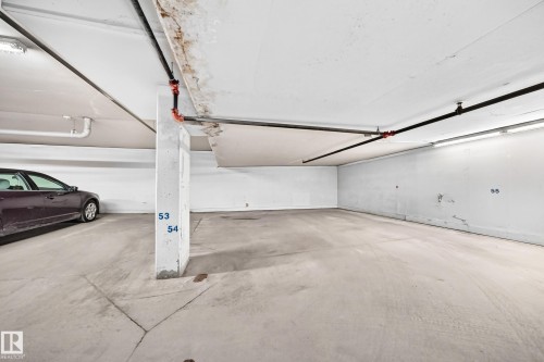 #105 9938 104 St Nw, Edmonton, AB - Indoor Photo Showing Garage