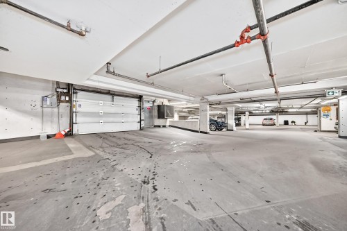 #105 9938 104 St Nw, Edmonton, AB - Indoor Photo Showing Garage