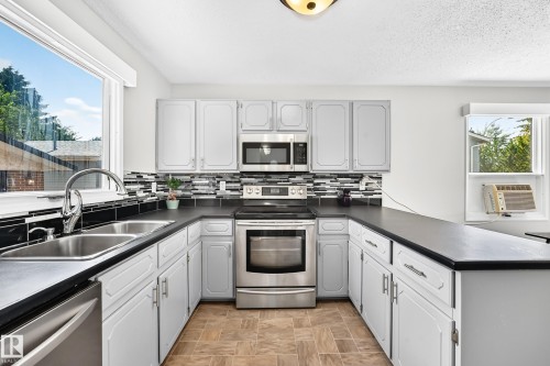 3615 10 Avenue Nw, Edmonton, AB - Indoor Photo Showing Kitchen With Double Sink