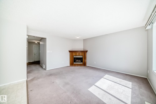 4319 39 Avenue Nw, Edmonton, AB - Indoor With Fireplace