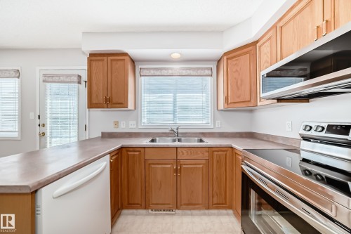 4319 39 Avenue Nw, Edmonton, AB - Indoor Photo Showing Kitchen With Double Sink