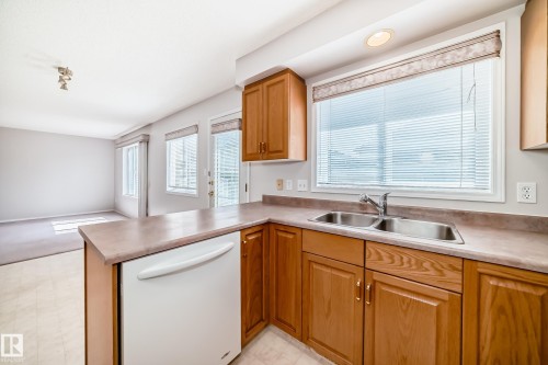 4319 39 Avenue Nw, Edmonton, AB - Indoor Photo Showing Kitchen With Double Sink