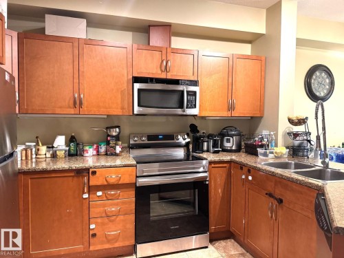 #117 4304 139 Av Nw, Edmonton, AB - Indoor Photo Showing Kitchen With Double Sink