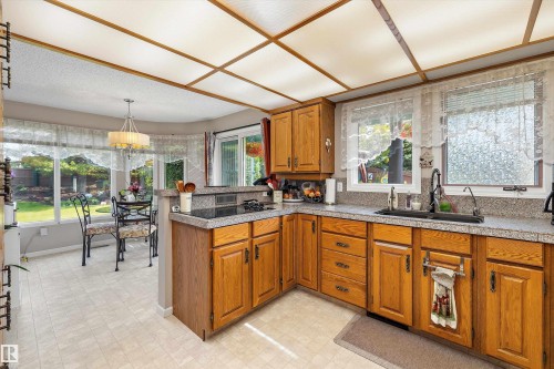 45 Blue Quill Crescent Nw, Edmonton, AB - Indoor Photo Showing Kitchen With Double Sink